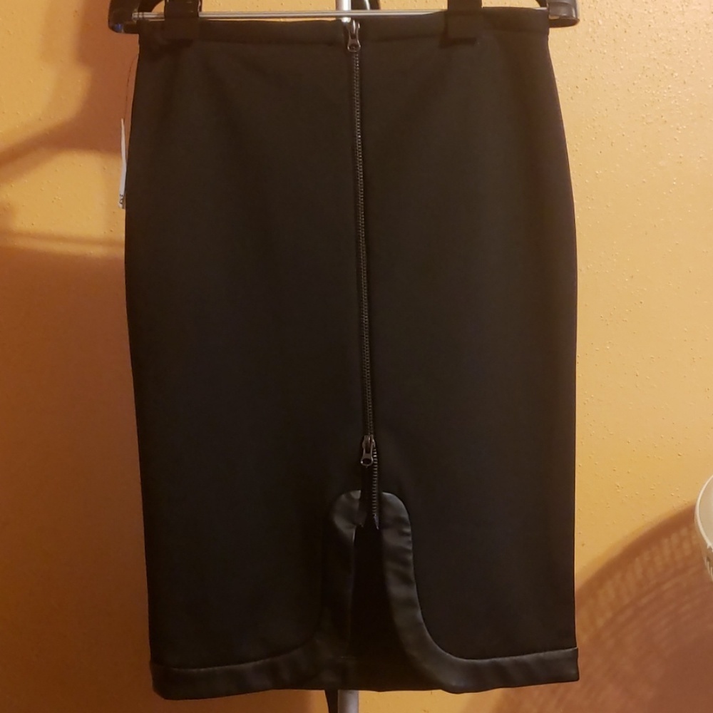 Black pencil skirt with back zipper.